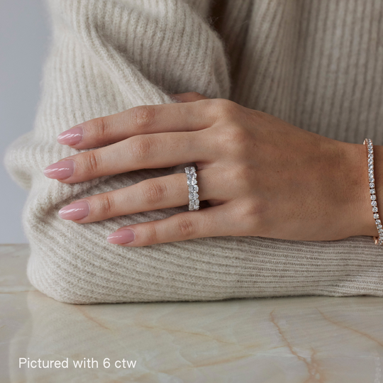 Pear brilliant cut eternity ring by IRALIS featuring lab-grown diamonds in DEF color and VS1–VS2 clarity, Zurich designed