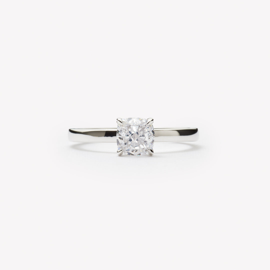 Cushion cut engagement ring by IRALIS – Zurich-designed fine jewelry with DEF color and VS1–VS2 clarity.