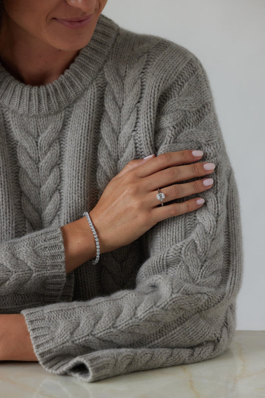 Emerald cut engagement ring with halo by IRALIS featuring lab-grown diamonds, DEF color and VS1–VS2 clarity, Zurich designed