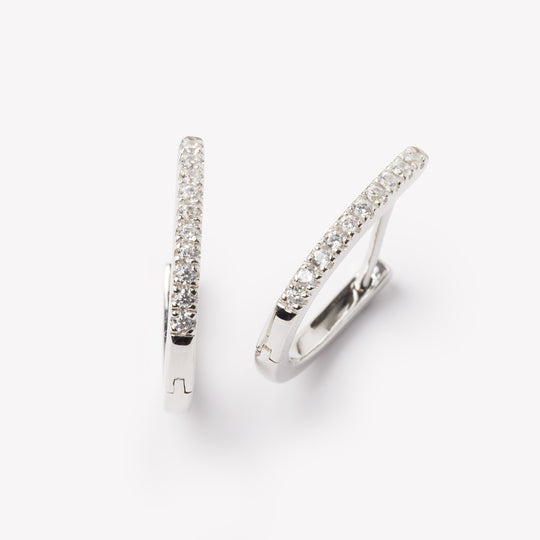 18k gold lab grown diamond earrings. Designed in Zurich.