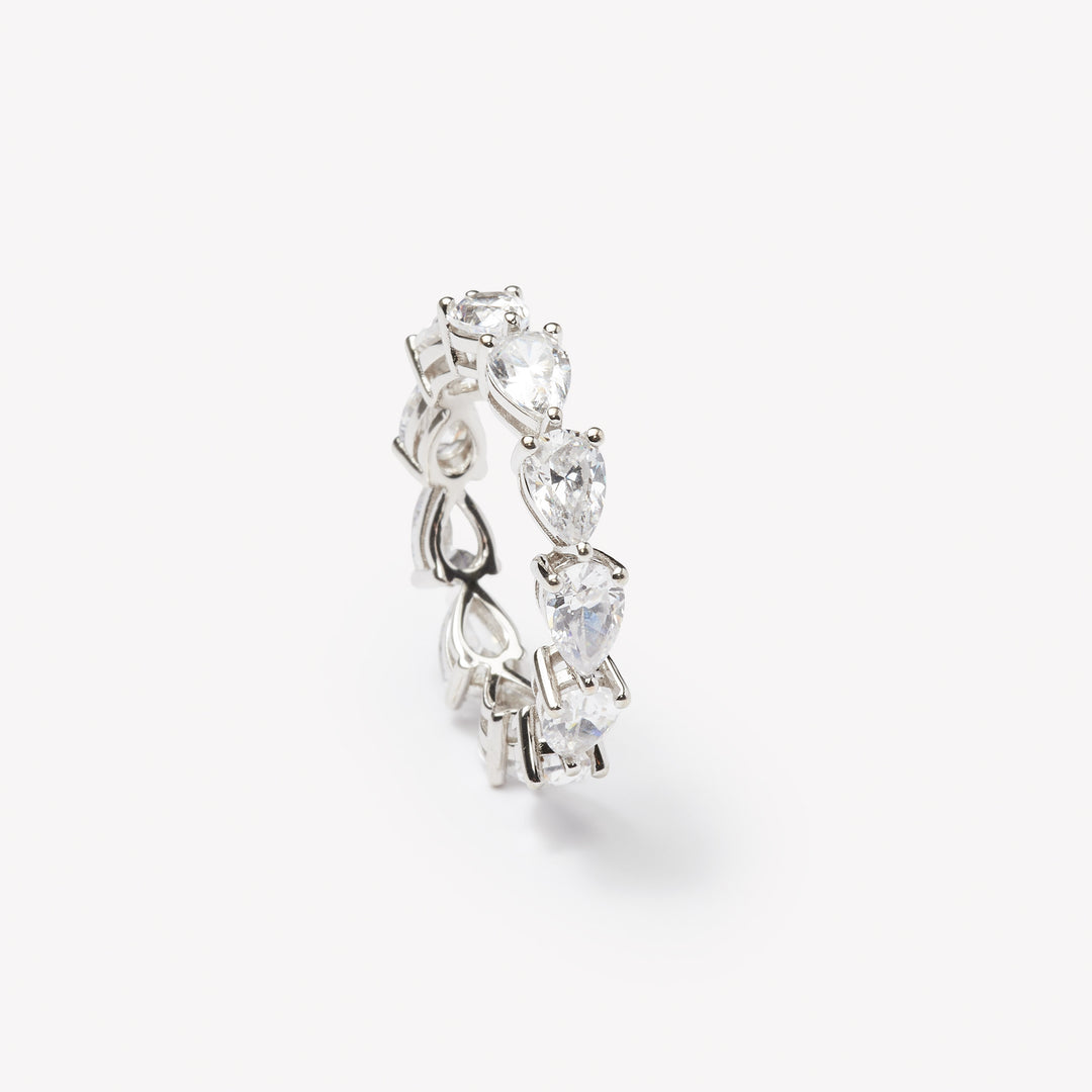 Pear cut eternity ring by IRALIS – Zurich-designed fine jewelry featuring DEF color and VS1–VS2 clarity.