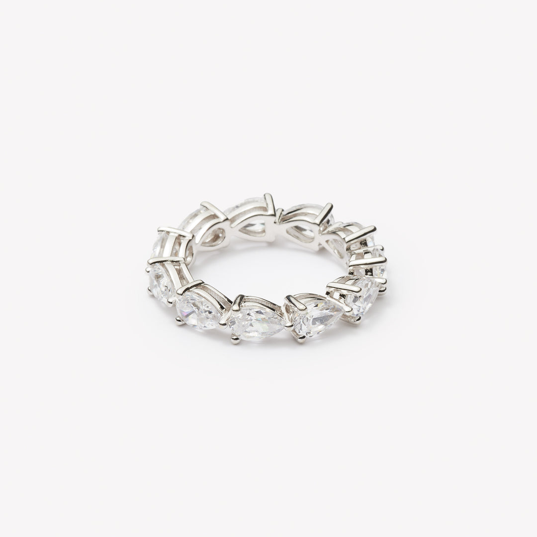 Pear cut eternity ring by IRALIS – Zurich-designed fine jewelry featuring DEF color and VS1–VS2 clarity.