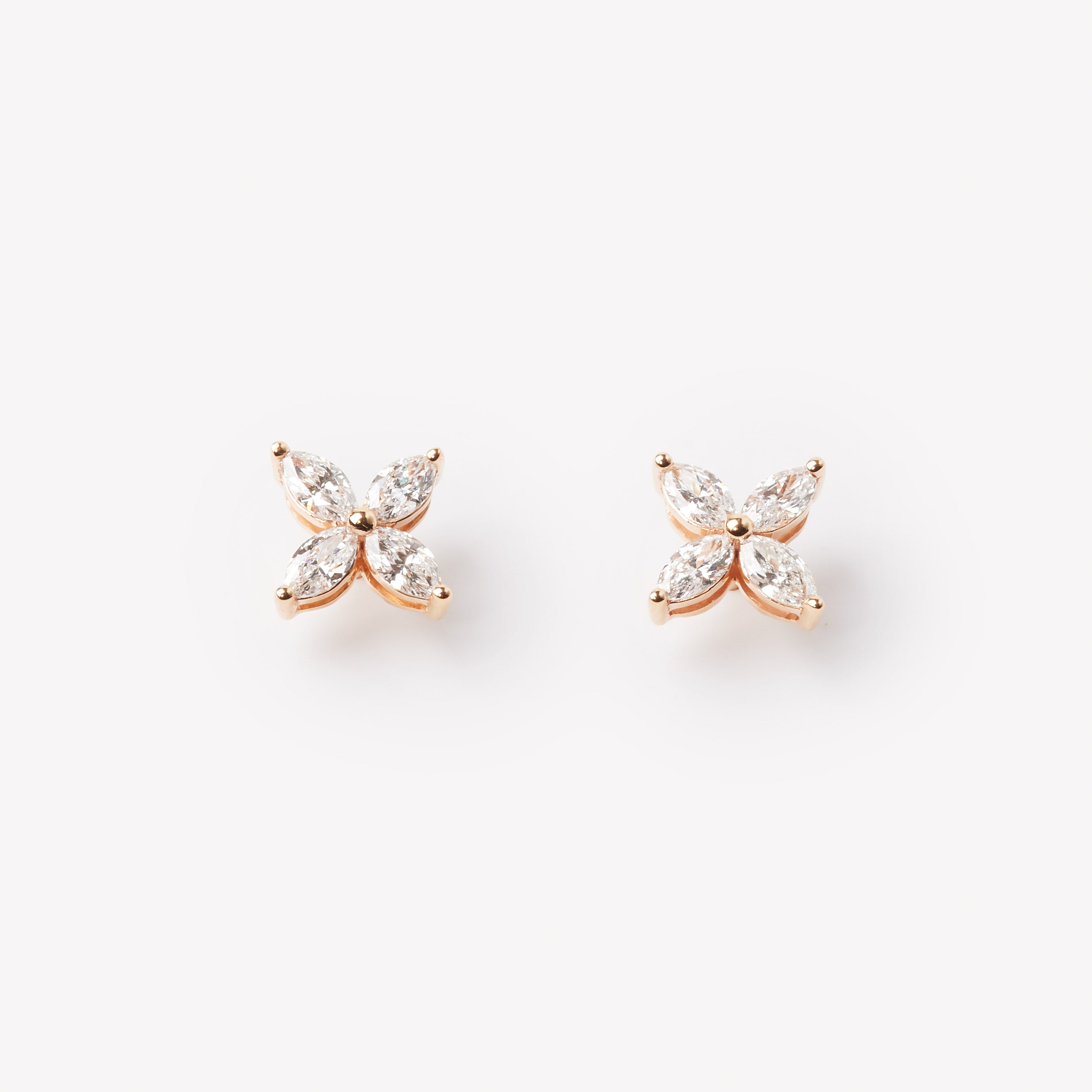 18k rose gold capri earrings with lab grown diamonds. Marquise cut.
