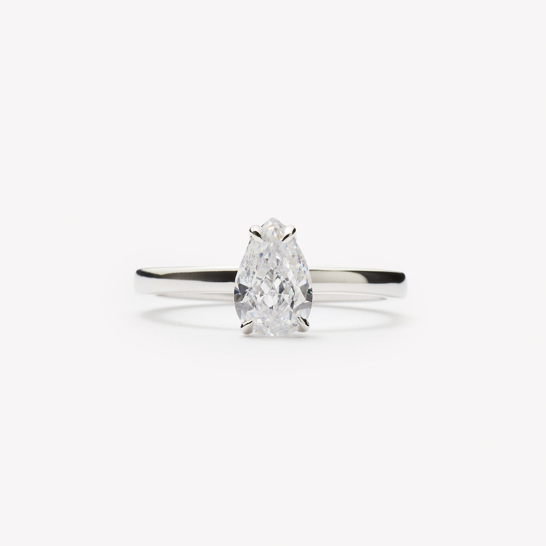 Elegant pear cut engagement ring by IRALIS – Zurich-designed fine jewelry with DEF color and VS1–VS2 clarity.