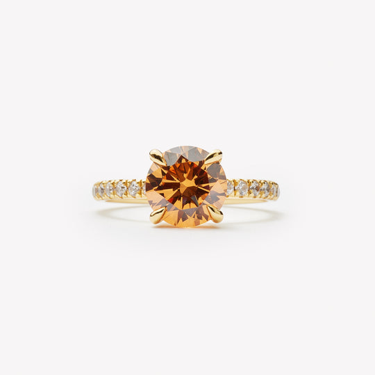 IRALIS engagement ring with round cut champagne diamond – Zurich-designed fine jewelry, pave setting, VS1–VS2 clarity.