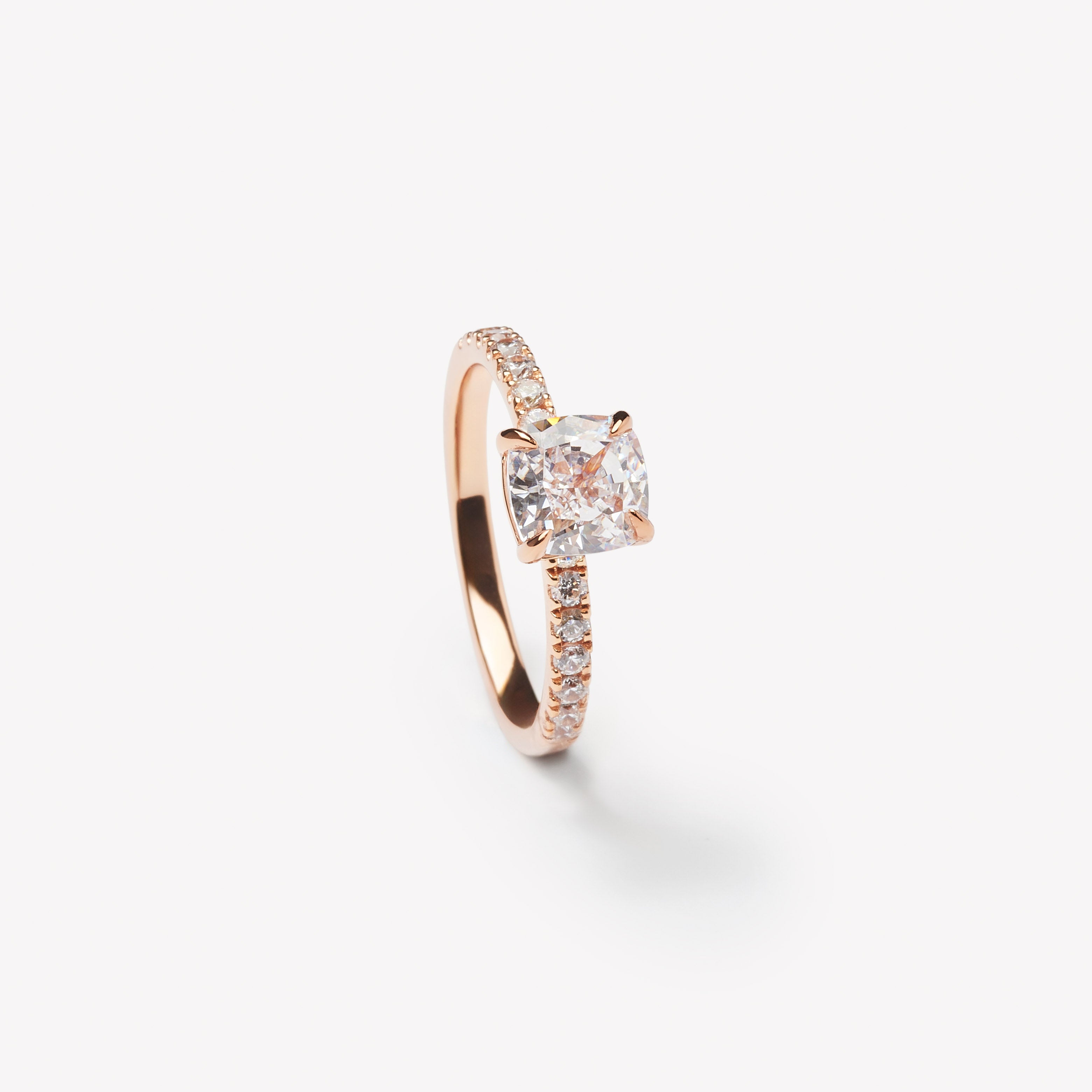 Cushion cut engagement ring by IRALIS featuring lab-grown diamonds with DEF color and VS1–VS2 clarity, Zurich designed