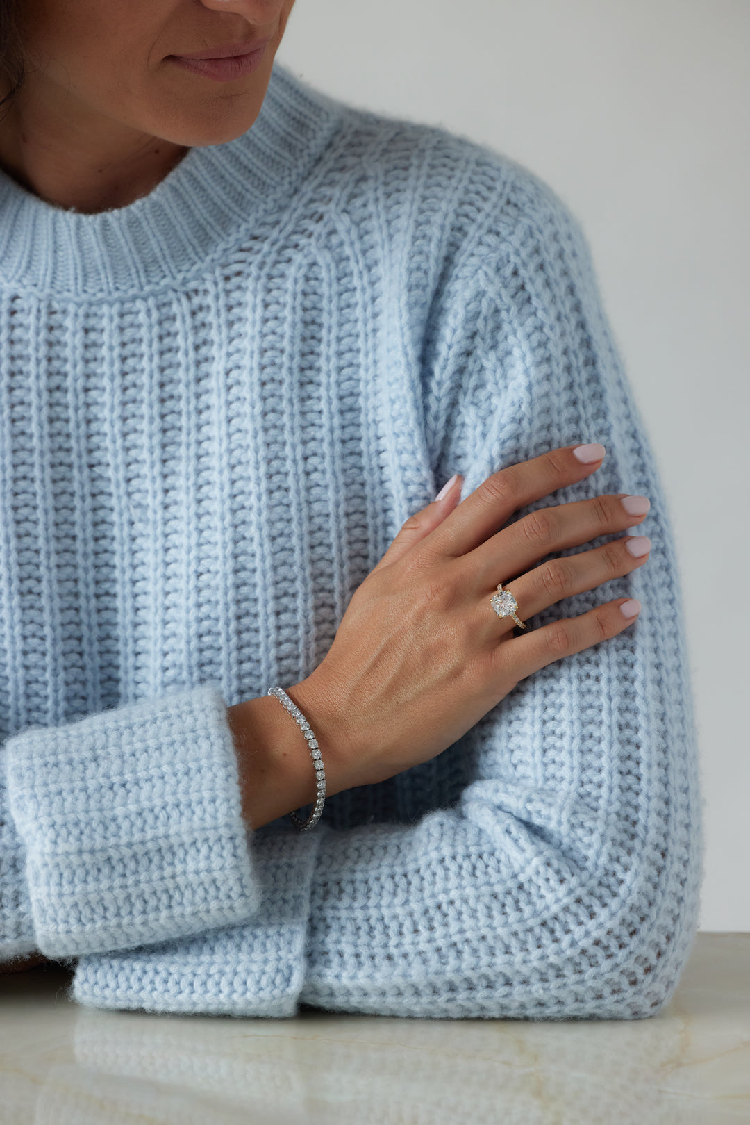 Cushion cut engagement ring by IRALIS featuring lab-grown diamonds with DEF color and VS1–VS2 clarity, Zurich designed.