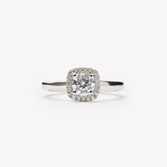Round cut engagement ring with square halo by IRALIS – Zurich-designed fine jewelry with DEF color and VS1–VS2 clarity.
