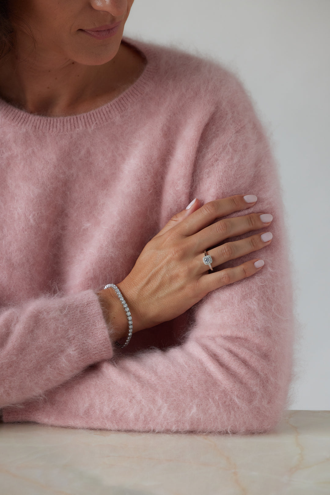 Round cut engagement ring with square halo by IRALIS – Zurich-designed fine jewelry with DEF color and VS1–VS2 clarity.