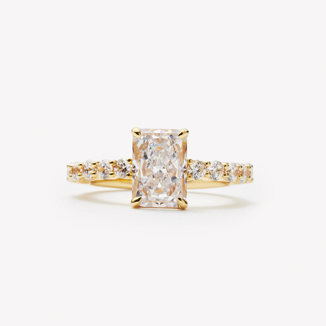 Radiant cut engagement ring by IRALIS with pave band and lab-grown diamonds in DEF color, VS1–VS2 clarity, Zurich designed
