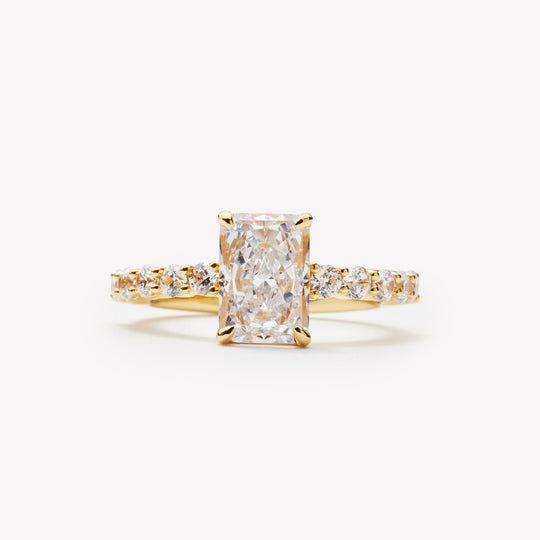 Radiant cut engagement ring by IRALIS with pave band and lab-grown diamonds in DEF color, VS1–VS2 clarity, Zurich designed