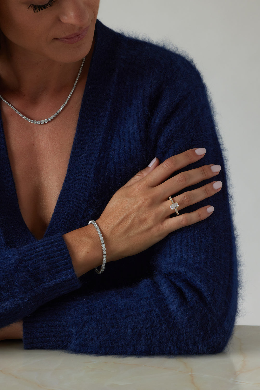 Radiant cut engagement ring by IRALIS with pave band and lab-grown diamonds in DEF color, VS1–VS2 clarity, Zurich designed