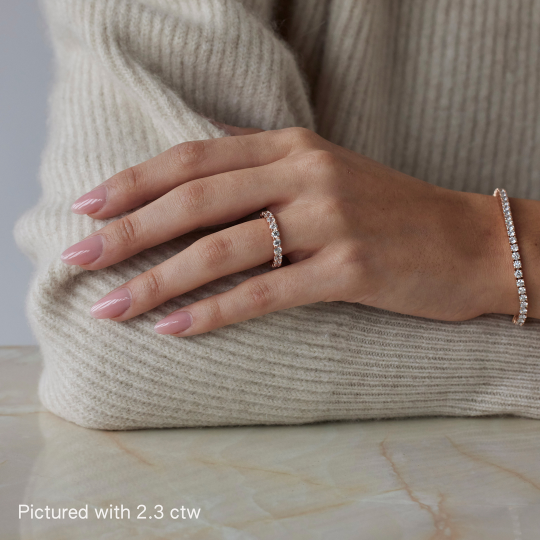 Round brilliant cut eternity ring by IRALIS featuring lab-grown diamonds in DEF color and VS1–VS2 clarity, Zurich designed