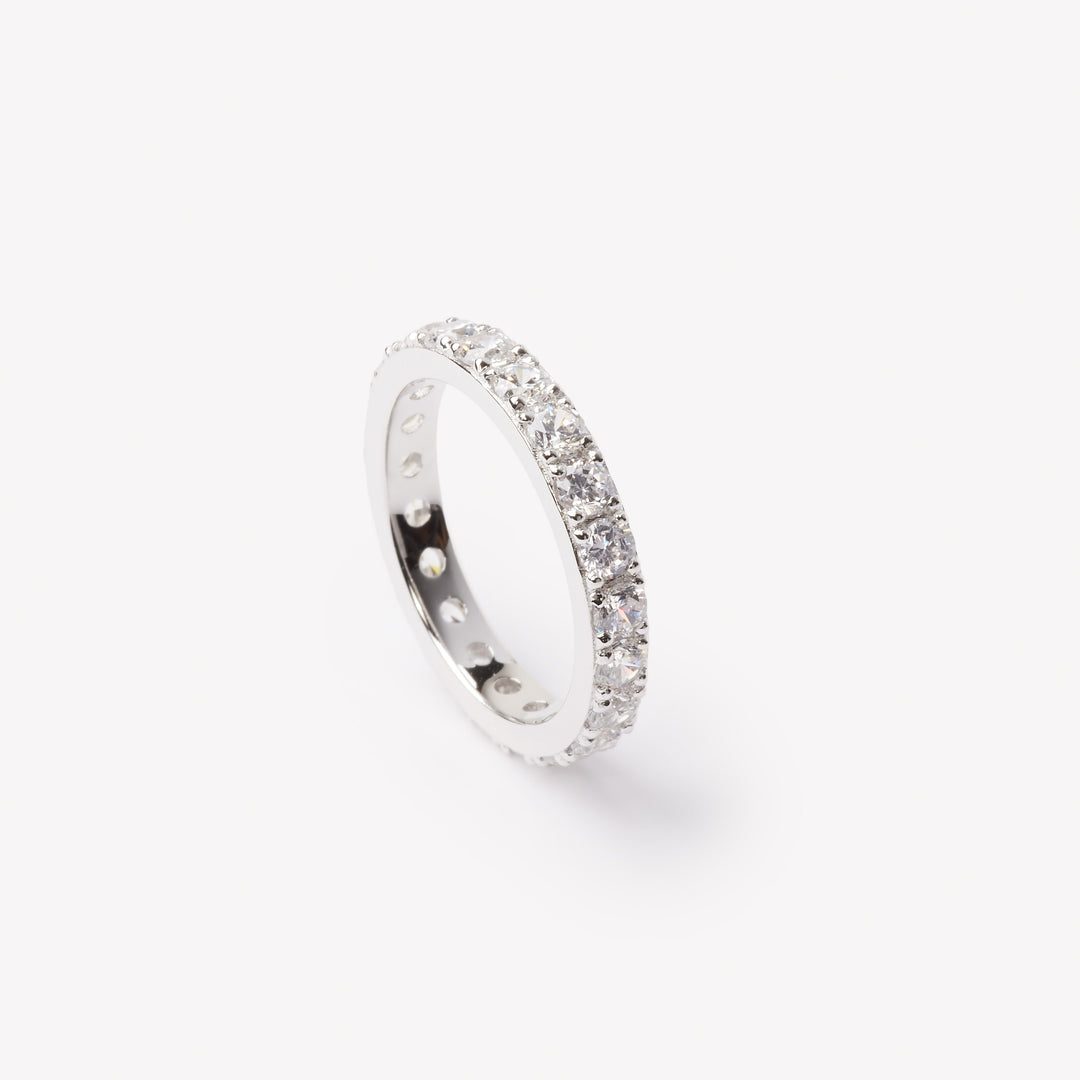 Round brilliant cut eternity ring by IRALIS featuring lab-grown diamonds in DEF color and VS1–VS2 clarity, Zurich designed