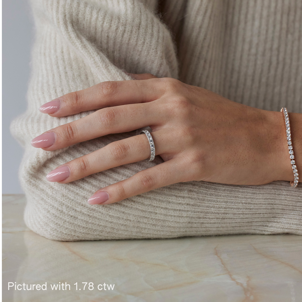 Round brilliant cut eternity ring by IRALIS featuring lab-grown diamonds in DEF color and VS1–VS2 clarity, Zurich designed