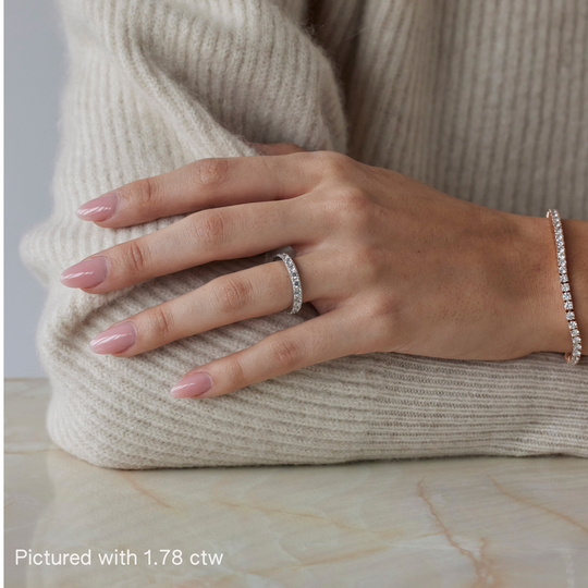 Round brilliant cut eternity ring by IRALIS featuring lab-grown diamonds in DEF color and VS1–VS2 clarity, Zurich designed