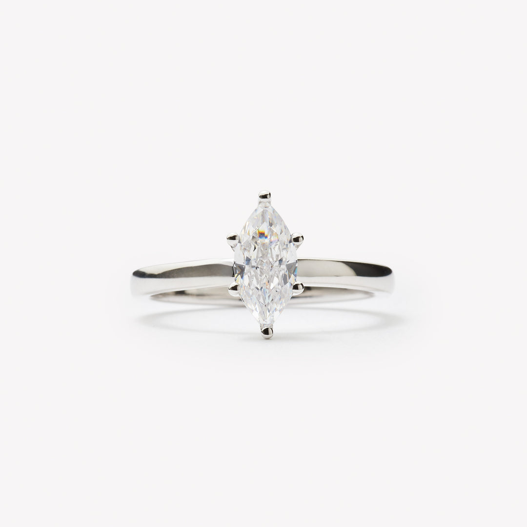 Elegant marquise cut engagement ring by IRALIS – Zurich-designed fine jewelry, featuring DEF color and VS1–VS2 clarity.