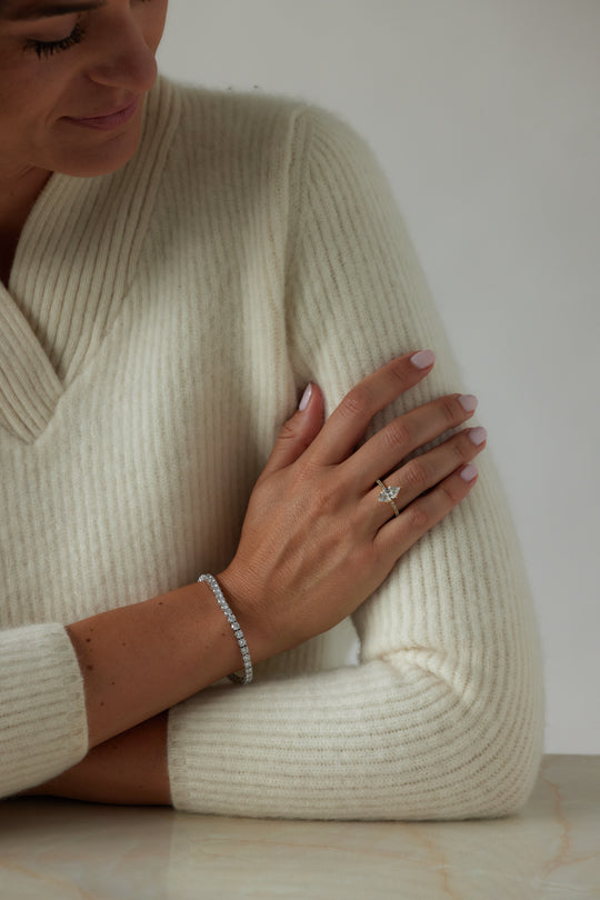 Marquise cut engagement ring by IRALIS featuring lab-grown diamonds with DEF color and VS1–VS2 clarity, Zurich designed