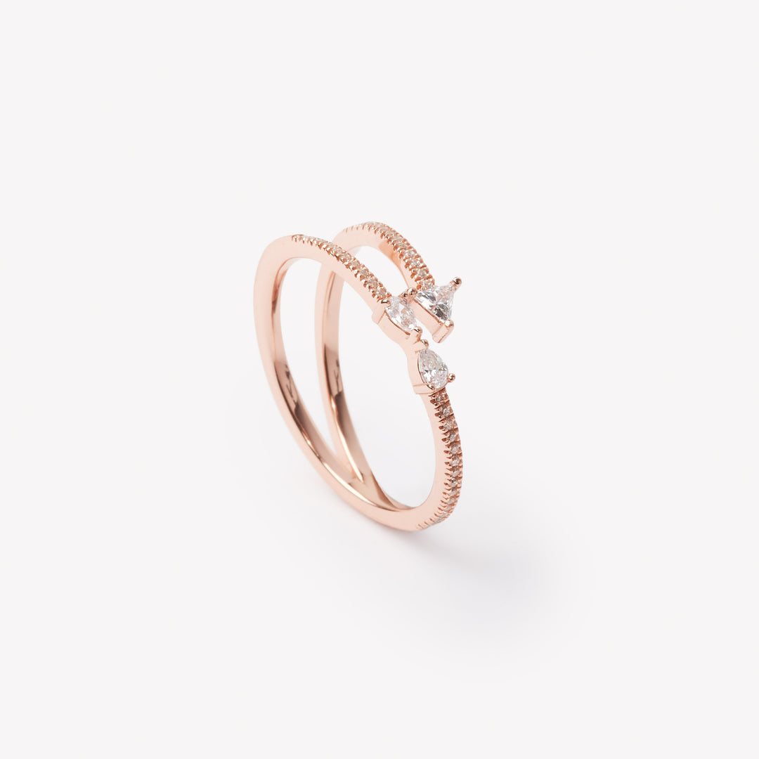 Triangle and pear cut diamond ring by IRALIS featuring lab-grown diamonds in DEF color and VS1–VS2 clarity, Zurich designed