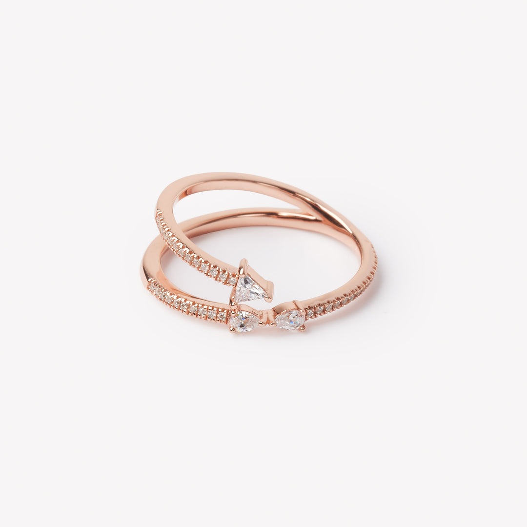 Triangle and pear cut diamond ring by IRALIS featuring lab-grown diamonds in DEF color and VS1–VS2 clarity, Zurich designed
