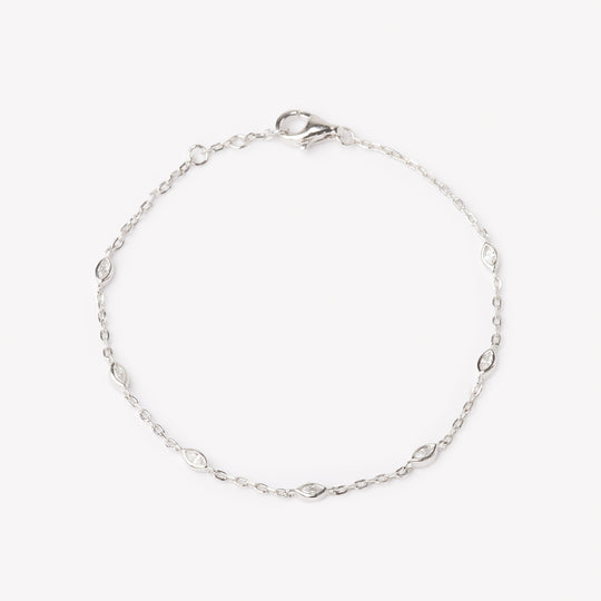 18k white gold bracelet with multiple marquise cut diamonds. Adjustable to different lengths.