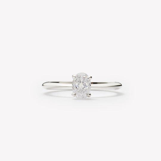 Oval cut engagement ring by IRALIS – Zurich-designed fine jewelry with plain knife setting, DEF color and VS1–VS2 clarity.