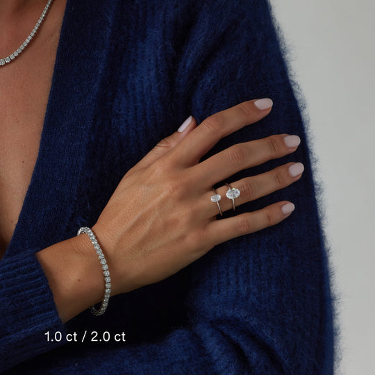 Oval cut engagement ring by IRALIS – Zurich-designed fine jewelry with plain knife setting, DEF color and VS1–VS2 clarity.