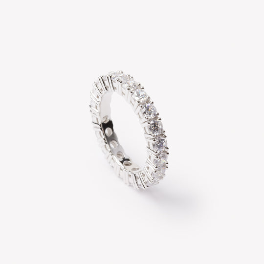 Round brilliant cut eternity ring by IRALIS featuring lab-grown diamonds in DEF color and VS1–VS2 clarity, Zurich designed