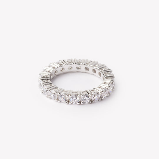 Round brilliant cut eternity ring by IRALIS featuring lab-grown diamonds in DEF color and VS1–VS2 clarity, Zurich designed