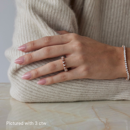 Triangle brilliant cut diamond ring by IRALIS featuring lab-grown diamonds in DEF color and VS1–VS2 clarity, Zurich designed