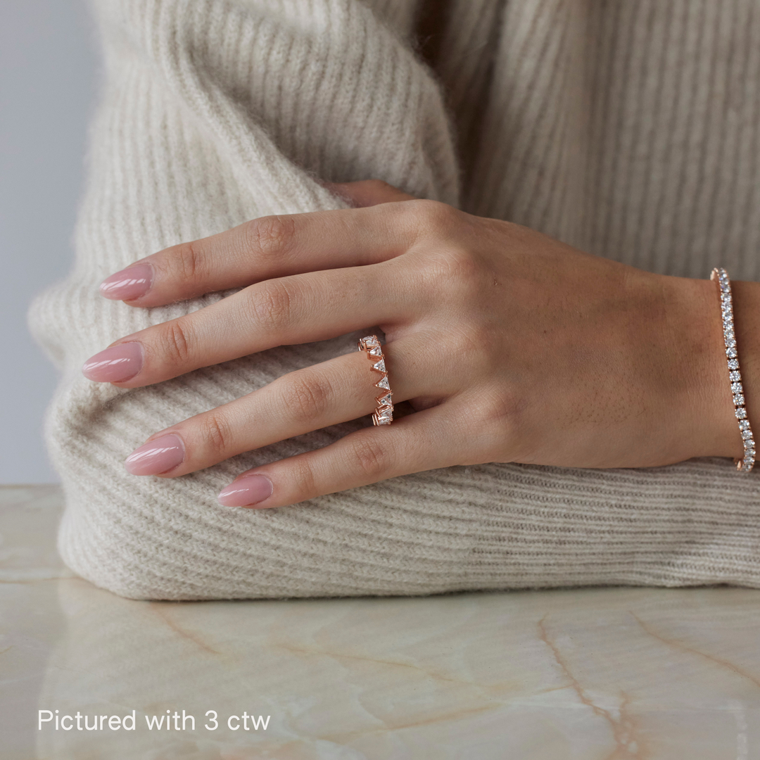 Triangle brilliant cut diamond ring by IRALIS featuring lab-grown diamonds in DEF color and VS1–VS2 clarity, Zurich designed