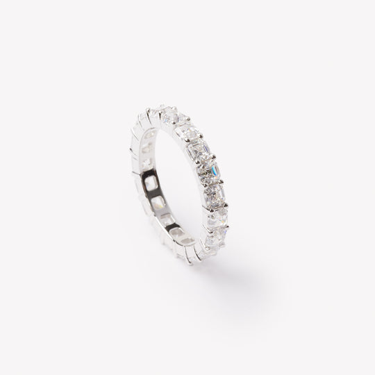 Asscher cut eternity ring by IRALIS featuring lab-grown diamonds in DEF color and VS1–VS2 clarity, Zurich designed