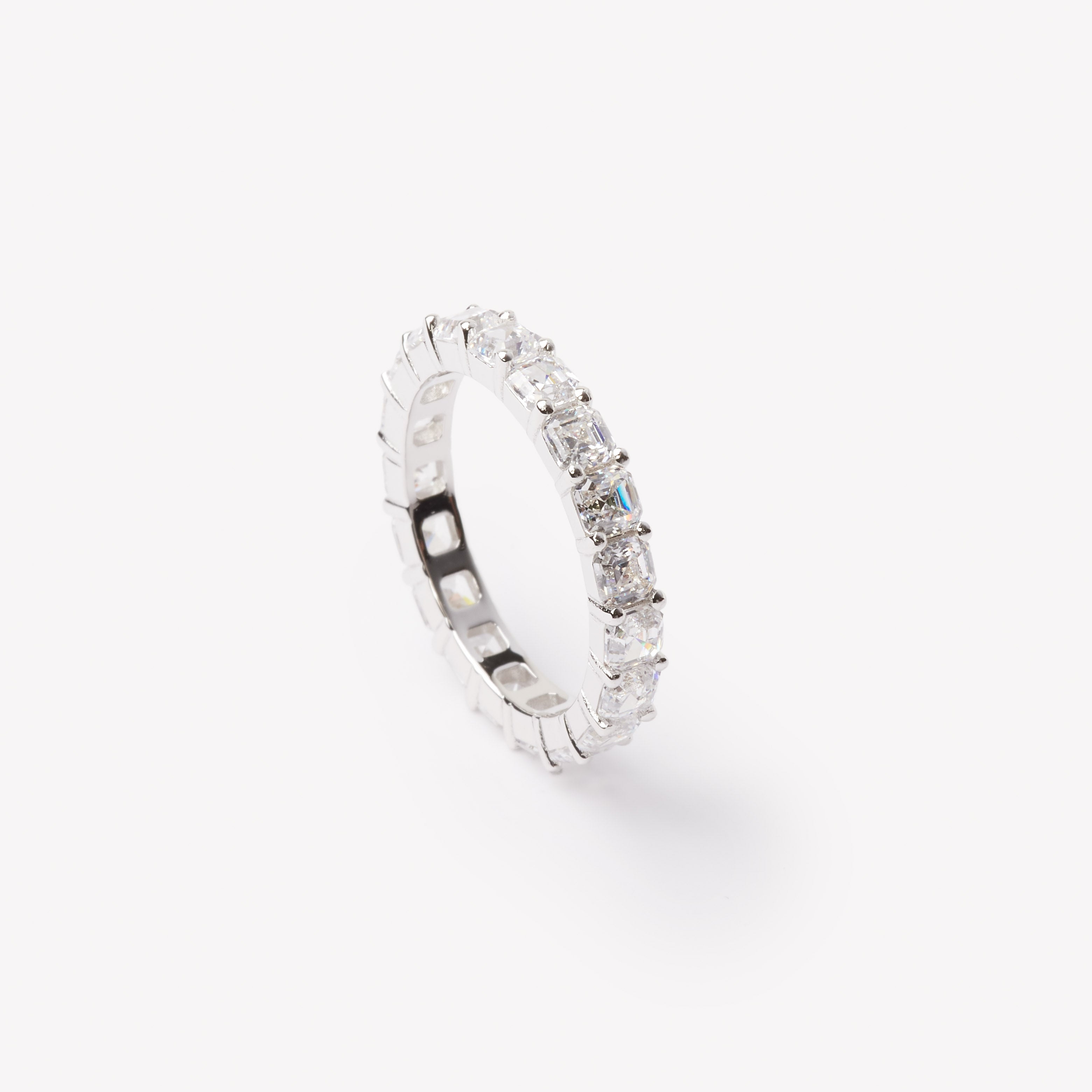 Asscher cut eternity ring by IRALIS featuring lab-grown diamonds in DEF color and VS1–VS2 clarity, Zurich designed