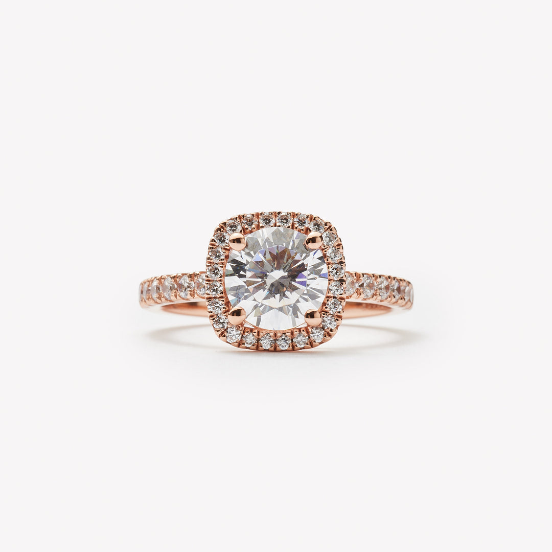 Round cut engagement ring with square halo by IRALIS – Zurich-designed fine jewelry with pave setting and VS1–VS2 clarity.