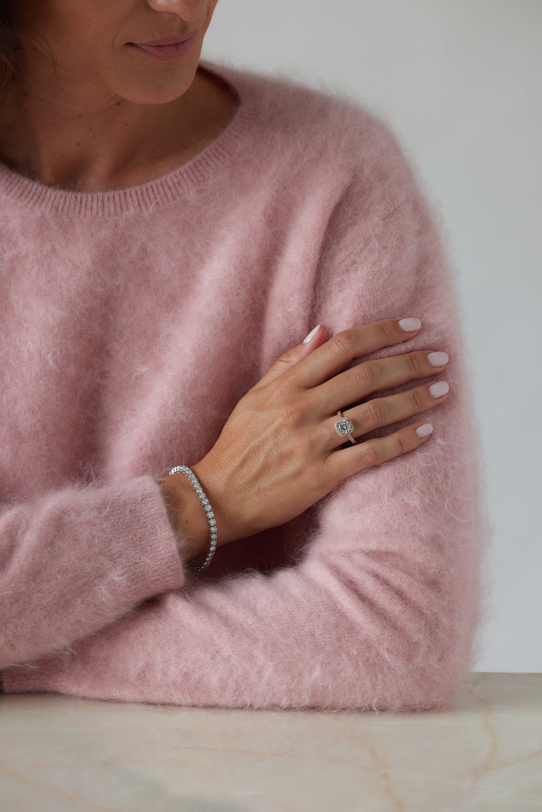 Round cut engagement ring with square halo by IRALIS – Zurich-designed fine jewelry with pave setting and VS1–VS2 clarity.