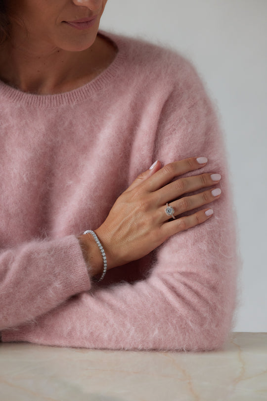 Round cut engagement ring with square halo by IRALIS – Zurich-designed fine jewelry with pave setting and VS1–VS2 clarity.