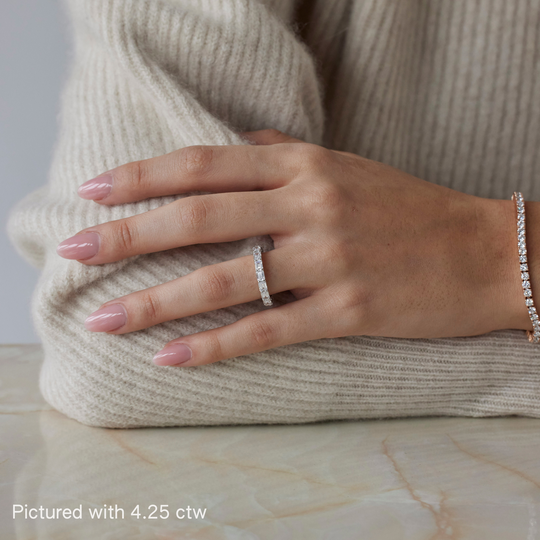 Baguette cut eternity ring by IRALIS featuring lab-grown diamonds in DEF color and VS1–VS2 clarity, Zurich designed