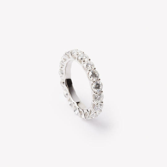 Round brilliant cut eternity ring by IRALIS featuring lab-grown diamonds in DEF color and VS1–VS2 clarity, Zurich designed
