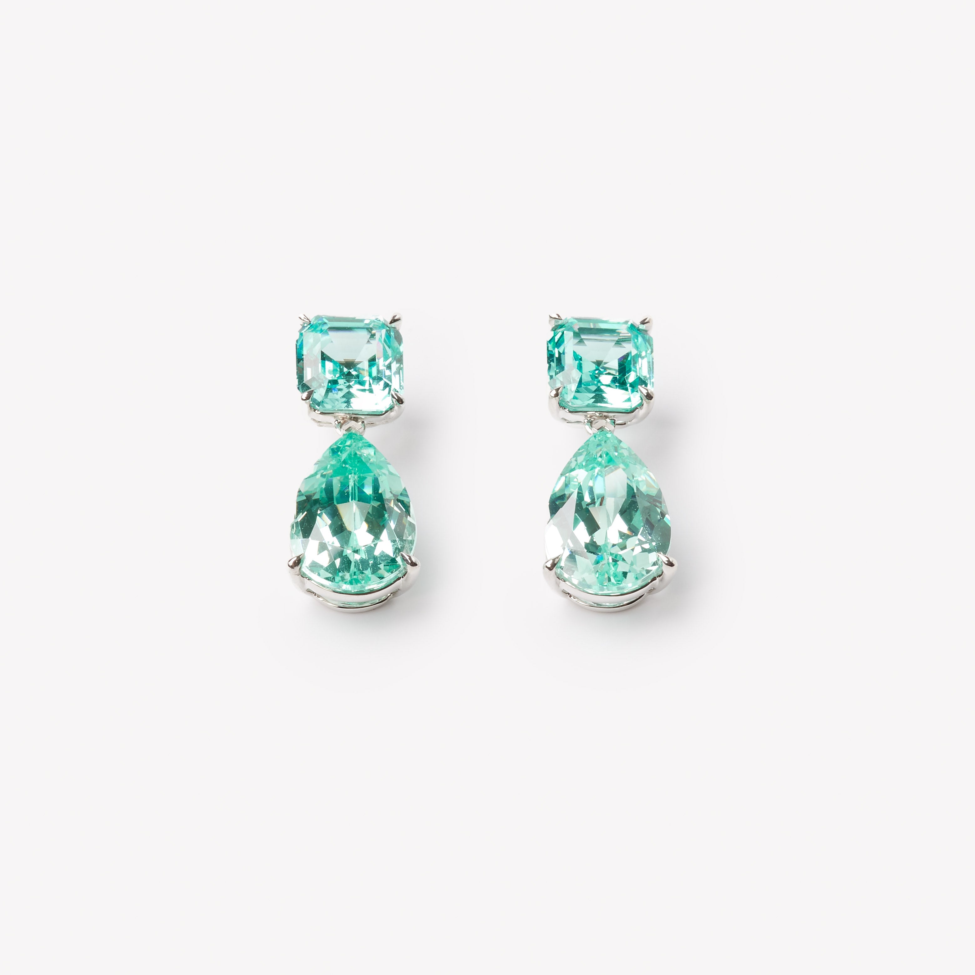 18k white gold paraiba earrings. Pear and asscher cut with classic tiger claw setting.