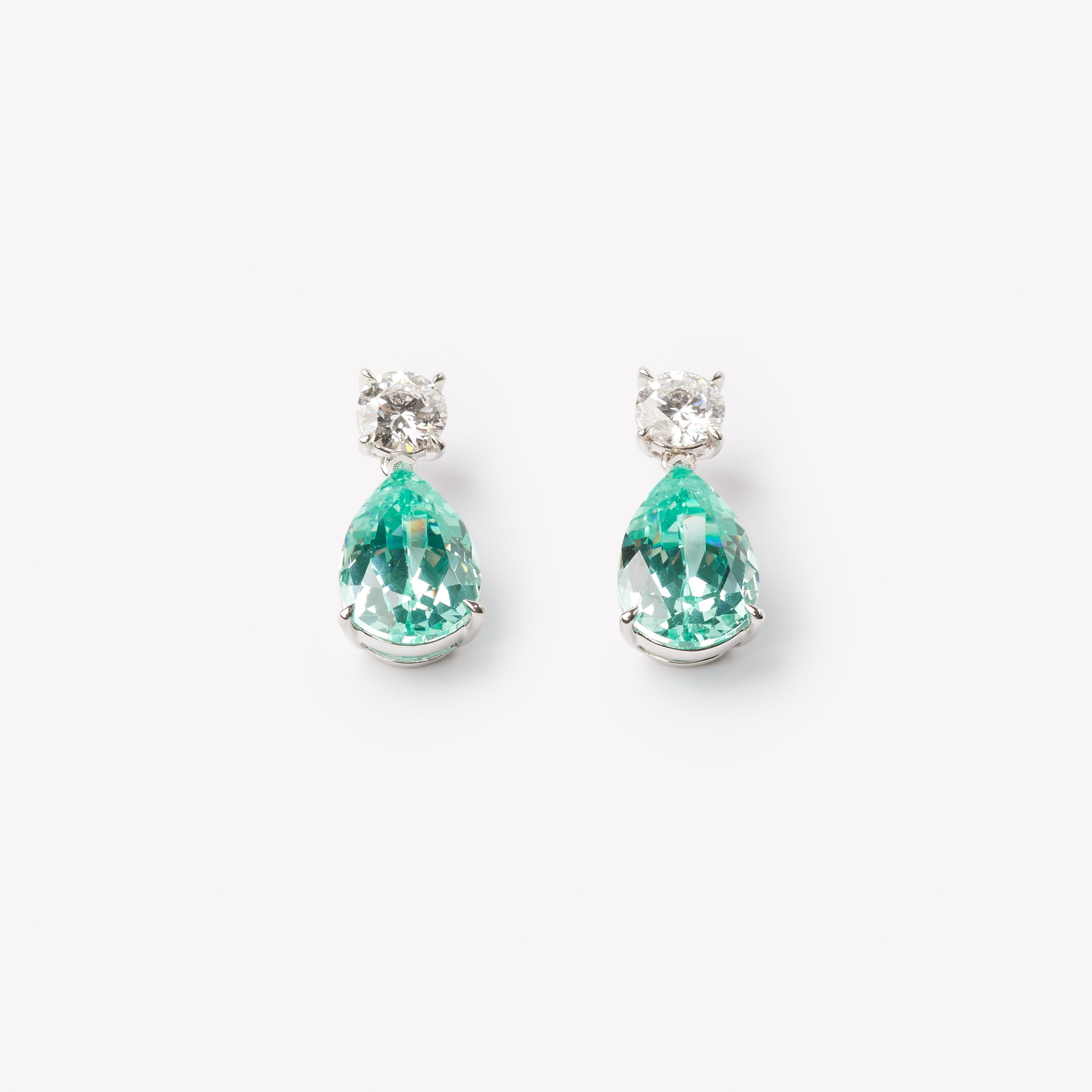 18k gold lab grown diamond and paraiba earrings. Round brilliant and pear cut with tiger claw setting.