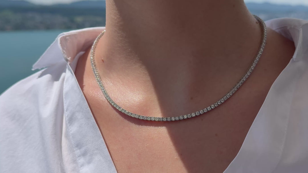 Round brilliant cut tennis necklace by IRALIS featuring lab-grown DEF color diamonds in four-prong setting, Zurich designed