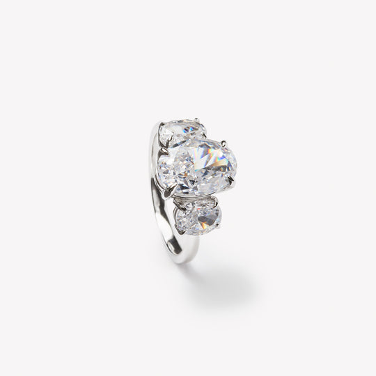 Oval cut three-stone engagement ring by IRALIS featuring lab-grown diamonds in DEF color and VS1–VS2 clarity, Zurich designed