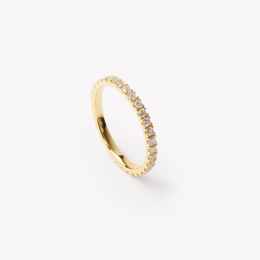 Round brilliant cut eternity ring by IRALIS featuring lab-grown diamonds in DEF color and VS1–VS2 clarity, Zurich designed