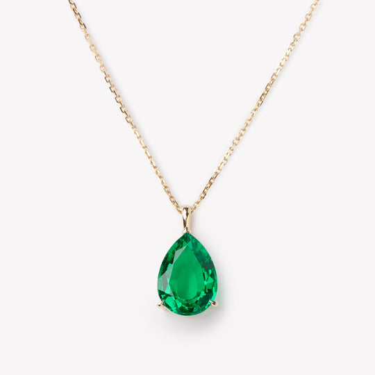 Elegant pear cut necklace by IRALIS showcasing lab-grown emeralds, Zurich designed and custom made