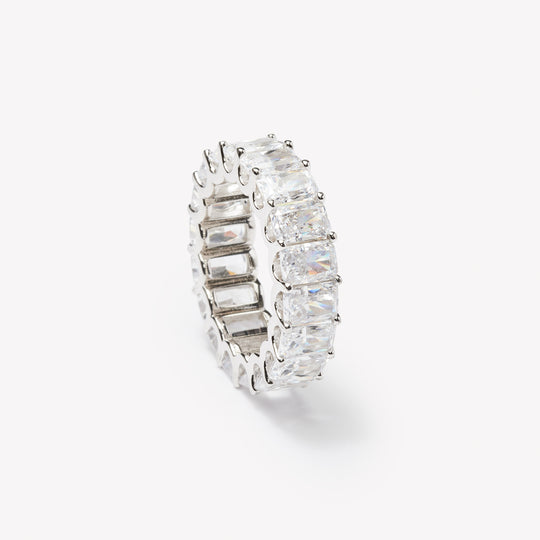 Radiant cut eternity ring by IRALIS featuring lab-grown diamonds in DEF color and VS1–VS2 clarity, Zurich designed