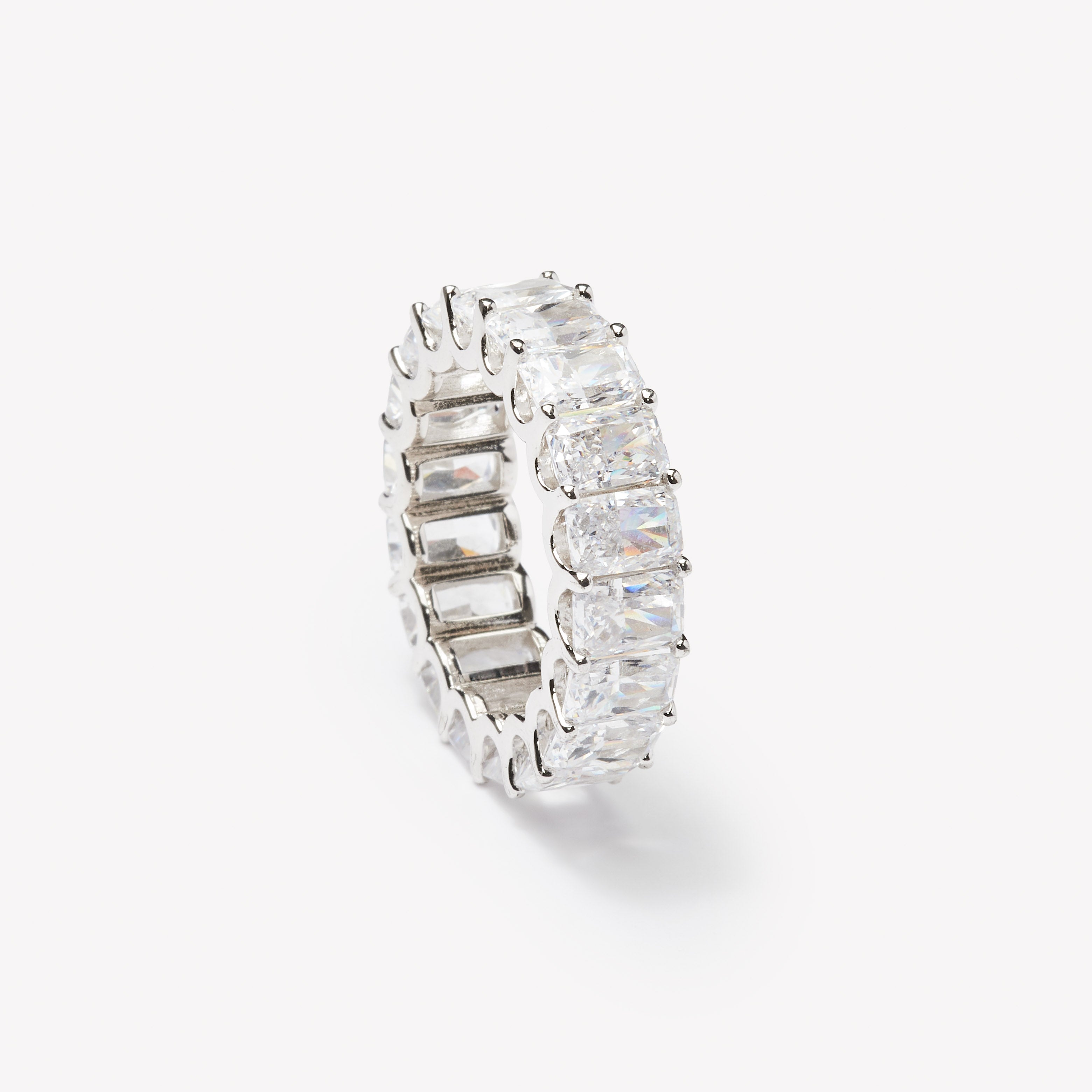 Radiant cut eternity ring by IRALIS featuring lab-grown diamonds in DEF color and VS1–VS2 clarity, Zurich designed