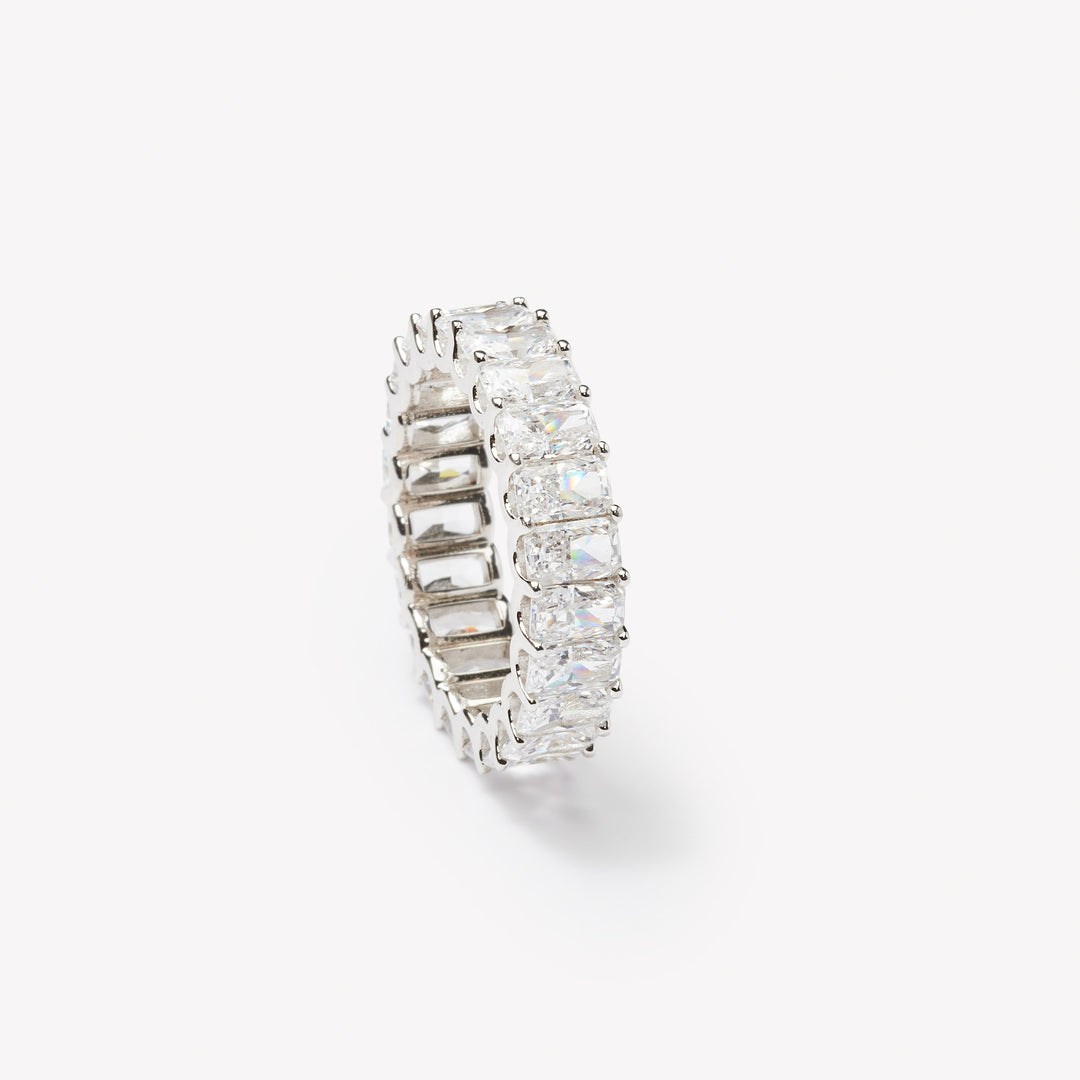 Radiant cut eternity ring by IRALIS featuring lab-grown diamonds in DEF color and VS1–VS2 clarity, Zurich designed