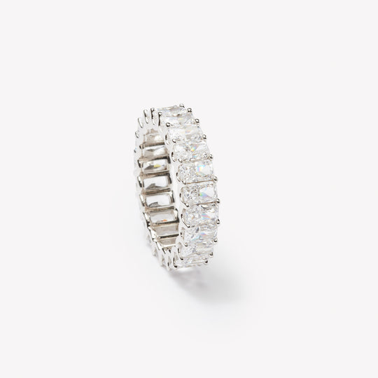 Radiant cut eternity ring by IRALIS featuring lab-grown diamonds in DEF color and VS1–VS2 clarity, Zurich designed
