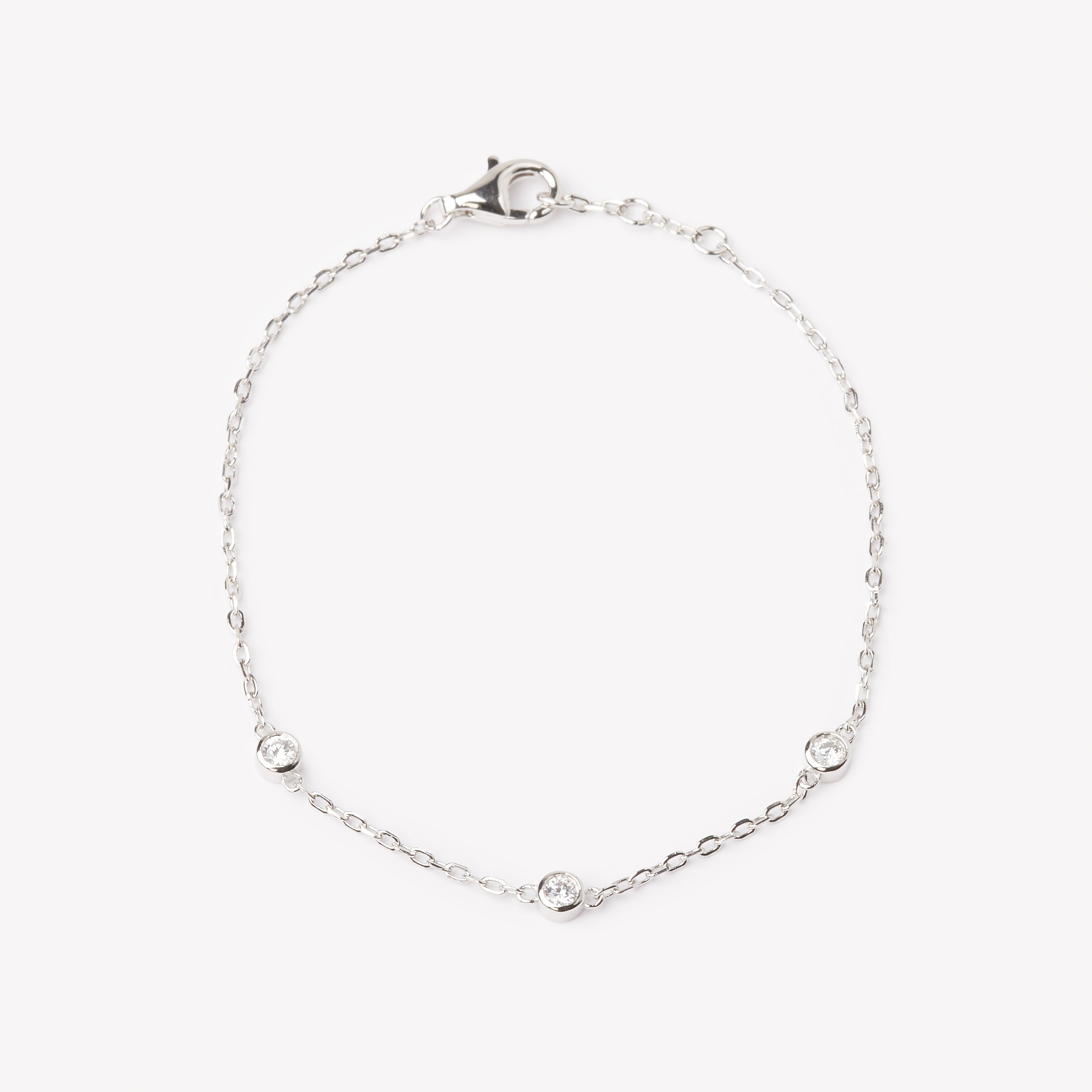 18k white gold bracelet with multiple round brilliant cut diamonds. Adjustable to different lengths.