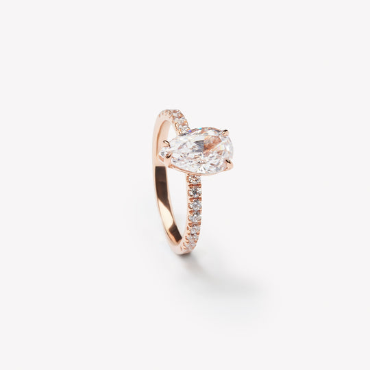 Elegant pear cut engagement ring by IRALIS – Zurich-designed fine jewelry with pave setting, DEF color and VS1–VS2 clarity.